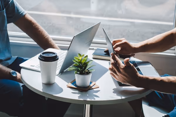 Laptops meeting in coffee shop